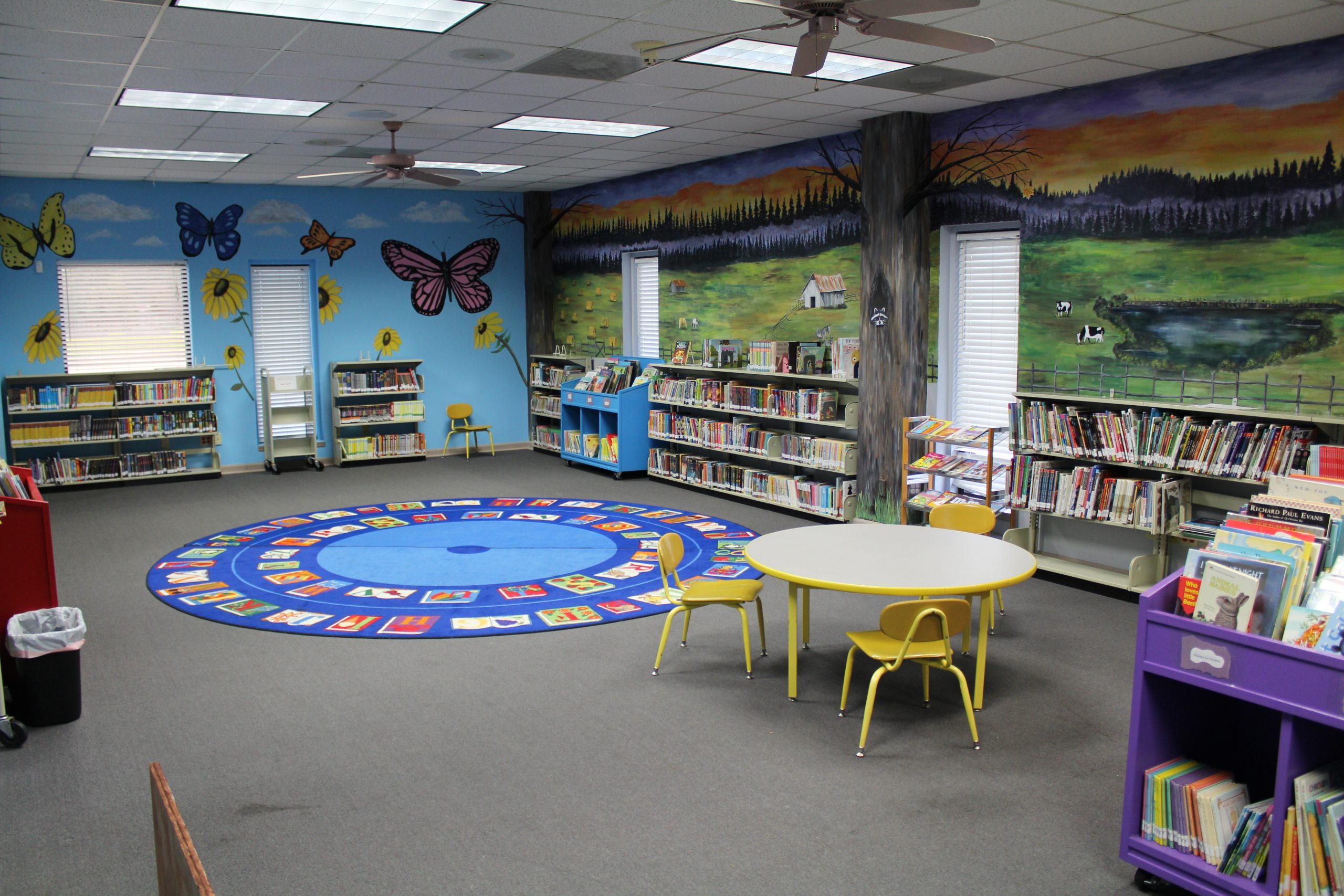 The kids' room with murals in the Priceville Public Library.