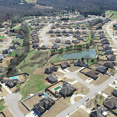 An aerial view of a picturesque residential neighborhood in Priceville, AL.