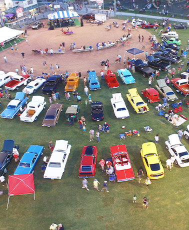 The community gathers at the annual Priceville Car Show, held at the local sports complex.